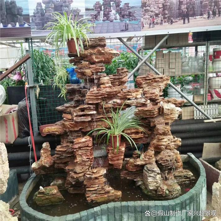 重庆梁平景区千层石假山设计及小型鱼池假山厂家推荐